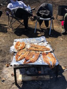 fish cooking outdoors